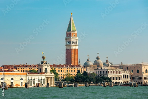 Fototapeta St. Mark's Campanile rising above the historic buildings, the domes of St. Mark's Basilica and the Doge's Palace in Venice, Italy.