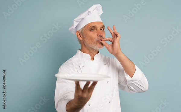 Fototapeta Portrait of chef, empty plate and smile, presenting menu special promo deal or restaurant product placement