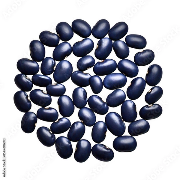 Fototapeta A circular arrangement of shiny black beans on a dark background creating a simple food pattern