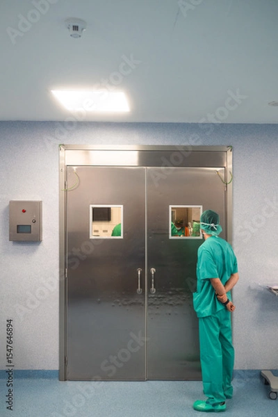 Fototapeta Surgeon entering the operating room
