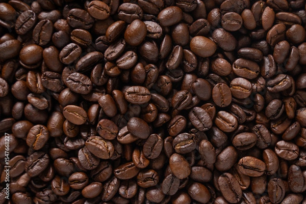 Obraz Roasted coffee beans background. Top view of dark brown coffee beans. Close up image.