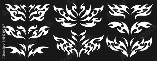 Fototapeta Vector set of neo tribal y2k tattoo. Neotribal dividers, symmetrical abstract shapes or cyber sigilism elements. White celtic gothic body ornaments. Emo butterfly stickers with wings and demon hearts.