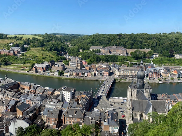 Obraz Aerial view of Dinant, Belgium, from the top of the citadel on a clear day, overlooking the Meuse River, cityscape, and surrounding landscape.