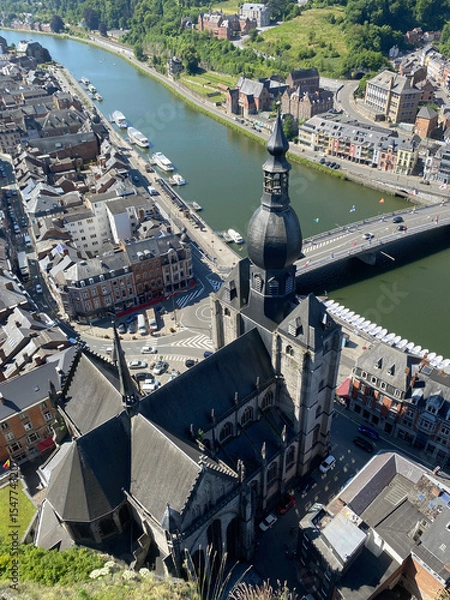 Obraz Aerial view of Dinant, Belgium, from the top of the citadel on a clear day, overlooking the Meuse River, cityscape, and surrounding landscape.