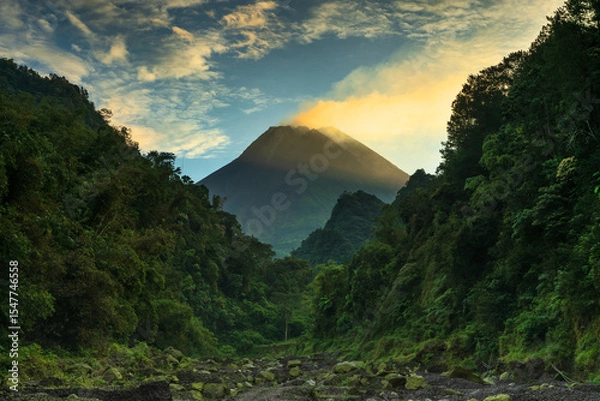 Fototapeta Sunrise view of Mount Merapi from Turgo Bawah
