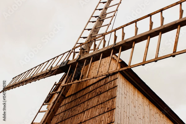 Fototapeta Classic Slavic Windmill Blade Structure with Timber Facade and Angular Composition