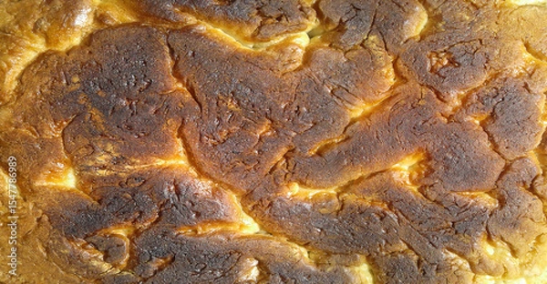 Fototapeta Bottom of fresh wheat bread. View texture food  baking product. Close-up.