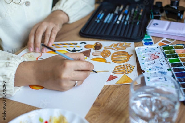 Fototapeta Humorists are Artists Month. Artist Painting Colorful Autumn Motifs on Paper