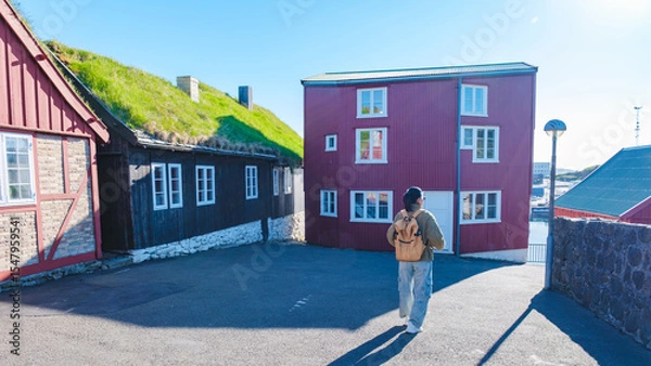 Fototapeta Exploring the charming architecture of the Faroe Islands on a sunny afternoon