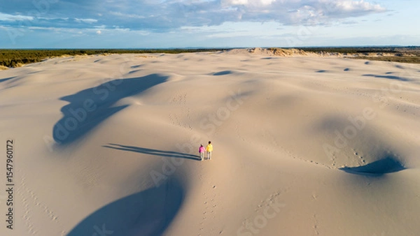 Fototapeta Discovering the serene beauty of Denmarks stunning sand dunes at sunset