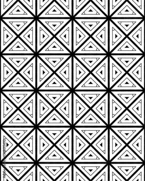 Fototapeta The design consists of interlocking triangles arranged in a repetitive, seamless pattern with a black and white color contrast