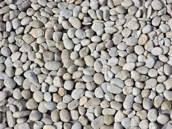 Obraz Smooth, rounded pebbles in various shades of gray and white create natural, textured surface, perfect for landscaping or decorative purposes
