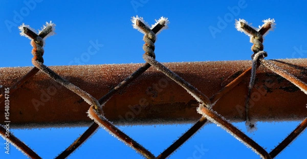 Fototapeta Chainlink Chain Link Fence with Icy Frost During Bitter Cold Winter