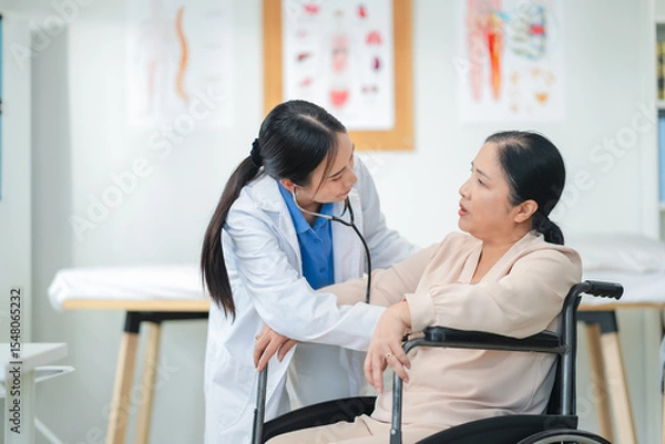 Fototapeta experienced female medical professional explains test results to a female patient during a clinic consultation. reviewing reports and discussing diagnosis and treatment options.compassionate care