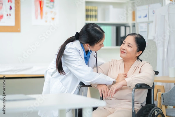 Fototapeta experienced female medical professional explains test results to a female patient during a clinic consultation. reviewing reports and discussing diagnosis and treatment options.compassionate care