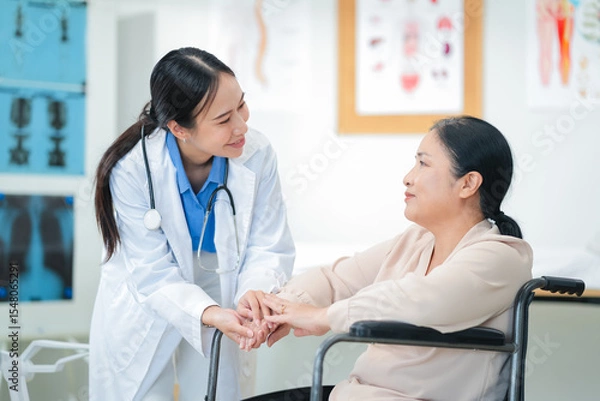 Fototapeta experienced female medical professional explains test results to a female patient during a clinic consultation. reviewing reports and discussing diagnosis and treatment options.compassionate care