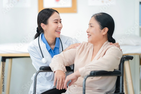 Fototapeta experienced female medical professional explains test results to a female patient during a clinic consultation. reviewing reports and discussing diagnosis and treatment options.compassionate care