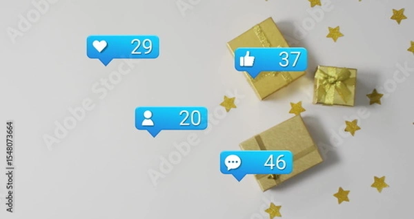 Fototapeta Showing gold gift boxes with confetti on white table, social media notification icons, copy space
