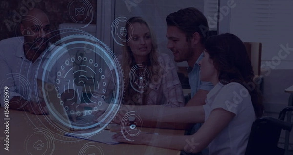 Obraz Professionals reviewing logs on laptop at office conference table with holographic fingerprint icon