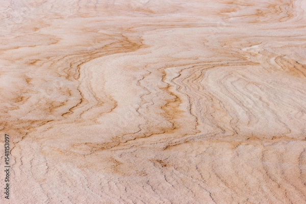 Fototapeta An abstract image is created from the drifting snow and sand over the beach at Harrington Beach State Park, Belgium, Wisconsin in ,mid-February