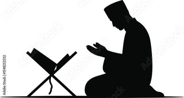 Obraz A silhouette of a man kneeling in prayer with a book stand against a white background in a studio shot