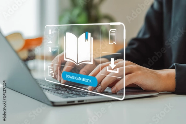 Obraz A user types on a laptop, displayed with a digital overlay showing an open book icon and a "Download Ebook" button, illustrating online ebook access. Ideal for ebook publishing or digital marketing.