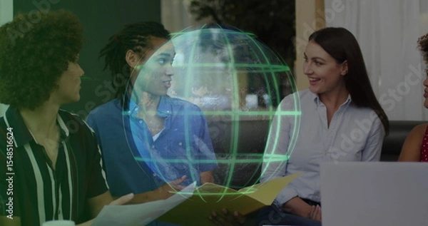 Fototapeta Reviewing data on laptop, four professionals collaborating in office lounge, with holographic globe
