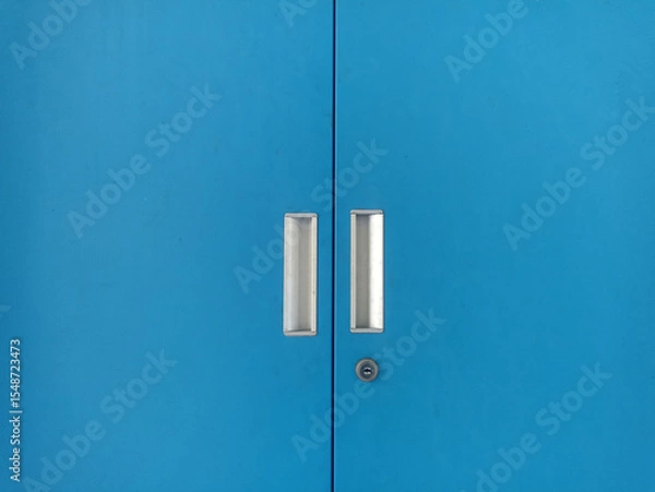 Fototapeta handle and lock on aluminum cabinet