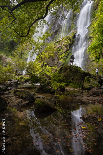 Fototapeta 
Khlong Lan Waterfall is one of the most beautiful and grand waterfalls in Thailand. Below it is a large pool where you can swim. It is located in Khlong Lan National Park, Kamphaeng Phet