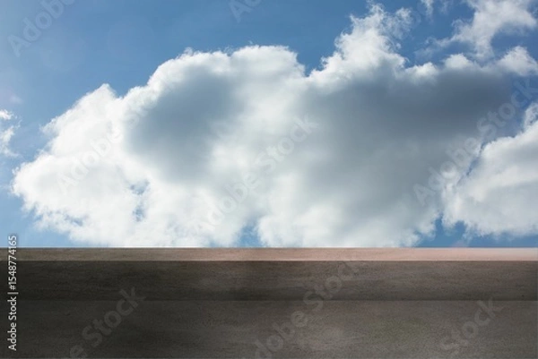 Fototapeta Flat design two-tiered concrete platform is sitting under blue sky featuring large cumulus cloud