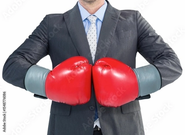 Obraz Businessman in gray suit with boxing gloves