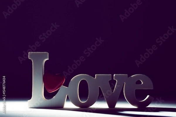 Obraz Word love and red heart on floor