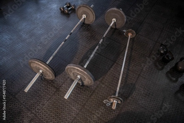 Obraz Barbells on floor in fitness studio