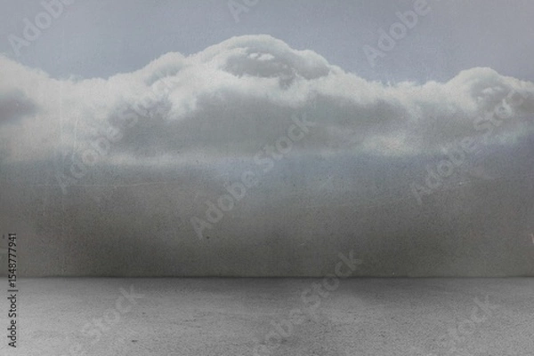 Fototapeta Calm water is meeting muted grey sky in minimalist seascape, featuring billowing cumulus cloud