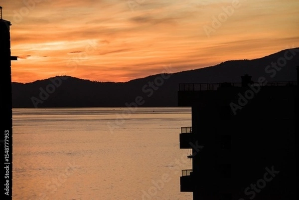 Obraz Scenic view of lake mountain during sunset