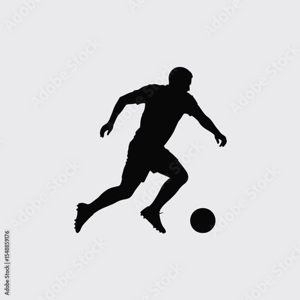 Fototapeta Black Silhouette of a Soccer Player Dynamically Dribbling a Ball Against a Light Gray Background football