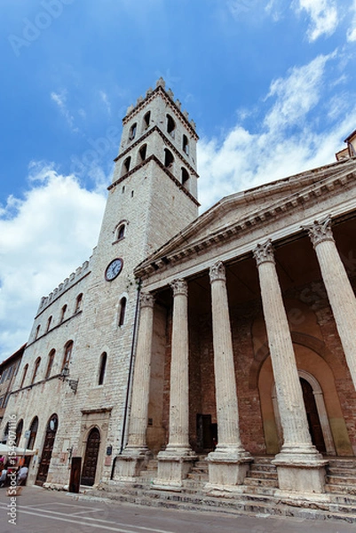 Fototapeta Minerva Temple in Assisi showcases ancient Roman architecture and historical significance in Umbria, Italy