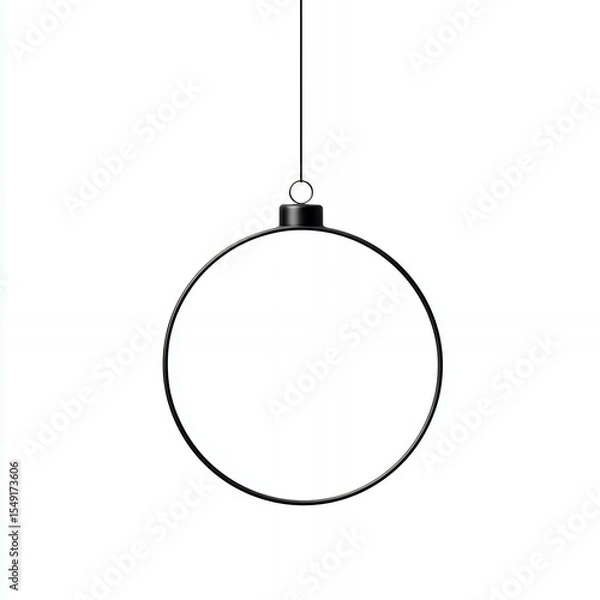 Fototapeta A black ornament hanging from a string. The ornament is a circle with a hole in the center