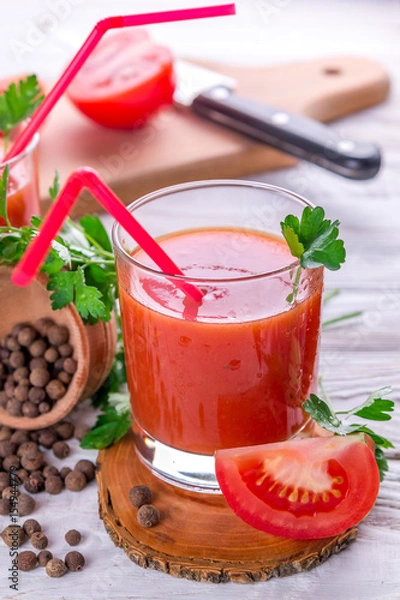 Fototapeta Tomato juice on white background