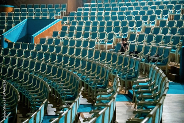 Fototapeta Empty rows of theatre seats in a classical hall