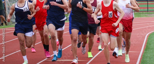 Obraz High School Boys Running in a Group During Track Competition