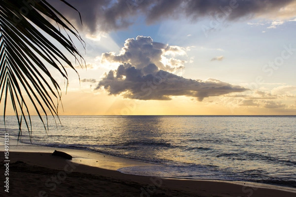 Fototapeta Sunset with cloud on island