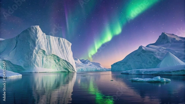 Fototapeta Breathtaking view of Northern Lights illuminating sky over icy landscapes, with serene water reflecting vibrant aurora and snow covered icebergs