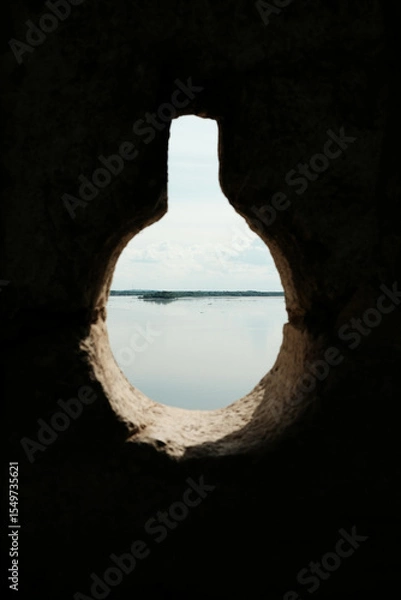 Obraz A scenic view of the Danube River through a keyhole-shaped opening in the fortress wall. Ram Fortress, Serbia