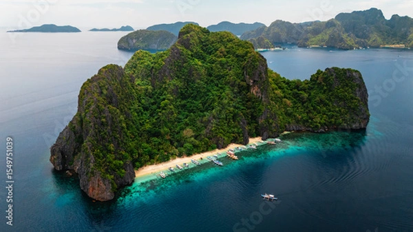 Obraz Wide Scenic Aerial Panorama of Bangka Boats Docked in Entalula Island’s Limestone Cliffs and Surrounding Islets in El Nido, Palawan, Philippines
