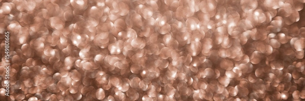 Fototapeta Mocha Mousse, brown sparkling glitter bokeh background banner, abstract defocused texture header. Holiday lights