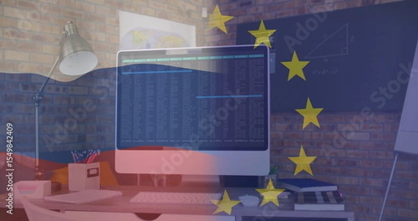 Obraz Showing computer monitor displaying code on desk with brick wall, map poster, charts, star overlay