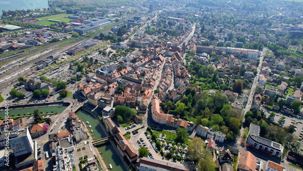 Fototapeta Panoramic aerial of the old town of the city  Yverdon-les-Bains in Switzerland on a sunny noon in summer