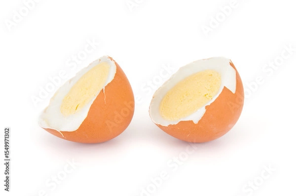 Fototapeta Two halves of egg isolated on white background