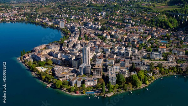 Fototapeta A panoramic aerial view around the old town of the city Montreux in Switzerland on a sunny spring noon